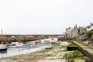 Low tide on Mousehole Port, Cornwall UK.