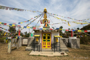 Small brightly painted shine or stupa, Namobuddha to Dhulikhel, Kathmandu Valley