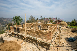 Men building a house, Namobuddha to Dhulikhel, Kathmandu Valley
