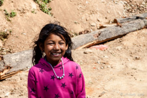 Smiling Nepali girl in pink, Dhulikhel to Nagarkot, Nepal