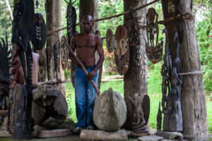 Drummer in the spirit house, Kanganaman Village, PNG