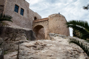 Arch and turret on the rocky outcrop, Santa Bárbara Castle, Alicante, Spain