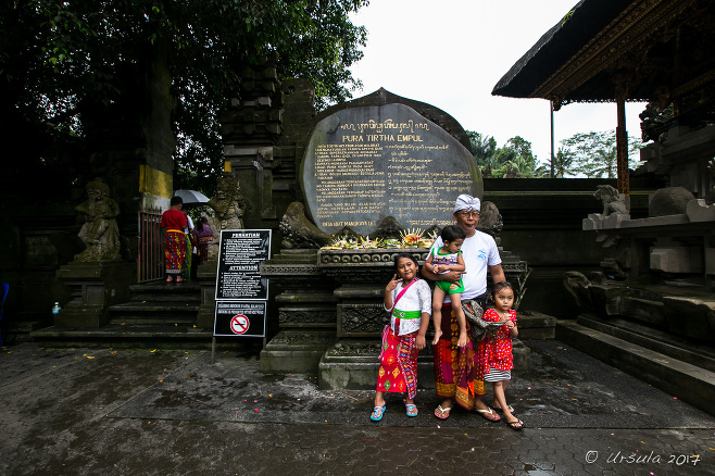 Balinese Family posing at the Entry to Pura Tirta Empul
