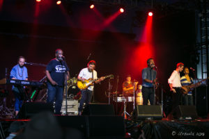 Clarence Bekker and Playing for Change on stage at Byron Bay Bluesfest 2018, AU