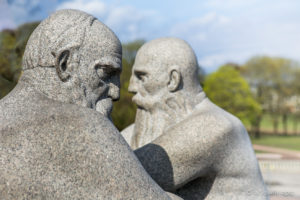 Vigeland sculpture of two men on the Monolith plateau, Frogner Park Oslo Norway.