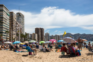 A busy section of Benidorm Beach, Spain