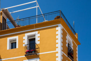 Balconies on a yellow building, Villajoyosa Spain