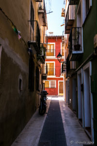 Motorcycle in a dark laneway, Villajoyosa Spain