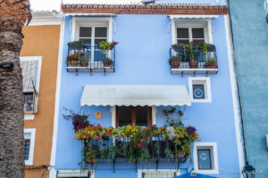 Balconies laden with flowering plants, Villajoyosa Spain