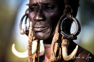 Mursi man in a Nilla Headdress, Ethiopia