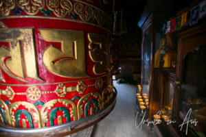 Prayer Wheel, Candles and Prayer Flags, Boudhanath Stupa, Kathmandu.