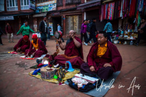Tibetan Buddhist monks playing music, Boudhanath Stupa, Kathmandu.