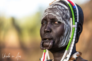 Mursi woman in a beaded Headdress, Omo Valley Ethiopia