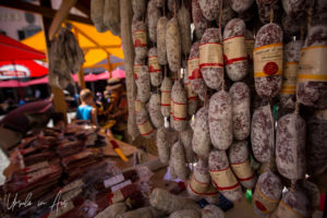 Sausages hanging in the Square, Piazza Comunale, Poschiavo, Switzerland