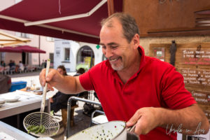 Orlando Lardi making pizzoccheri outside Hostaria del Borgo, Poschiavo, Switzerland