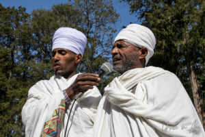 Ethiopian Priest Chanting outdoors, Entoto Maryam Church, Addis Ababa