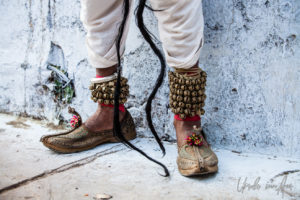 Rajasthani man's slippered feet and a long moustache, Pushkar India