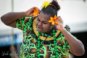 Female Malu Kiai Mura Buai dancer with flowers, Boomerang Byron Bay 2019