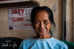 Portrait: Old Balinese woman, Pura Ululatu.