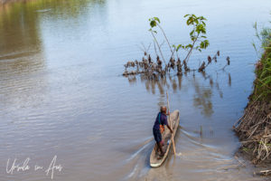 Papuan boy in a Dugout canoe, Sepik River PNG