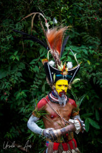 Huli Wigman with a Kundu Drum, Paiya Village Papua New Guinea