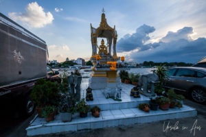 Afternoon sun behind a Shrine on the Chao Praya Bangkok, Thailand