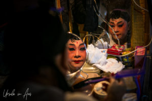 woman's face in two mirrors, Chao Zhou Shi Kong Shrine, Bangkok
