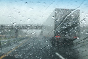 Looking at the back of a truck through a rainy windscreen, Florida USA