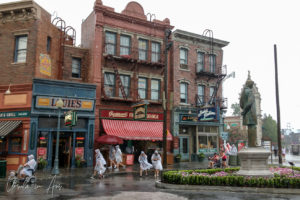 People in plastic raincoats in the Street, Universal Studios Florida USA