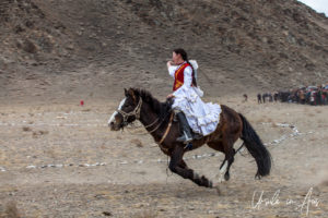 Young woman horseback, Golden Eagle Festival, Olgii Mongolia