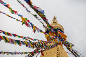 Prayer flags on the spire of Boudhanath, Kathmandu Nepal