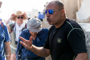 An Egyptian guide talking to his group, Giza.
