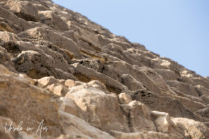 The rough edges of the ancient stones making up the Great Pyramid of Giza, Egypt.