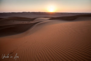 Sunrise over the desert dunes, Wahiba Sands, Oman