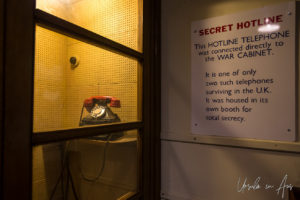 Red phone in a glass phone booth, Western Approaches Headquarters, Liverpool UK