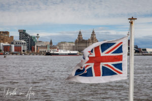 UK flag on the Mersey, the Royal Liver Building in the background, Liverpool