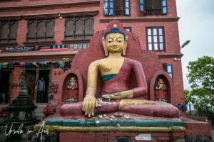 Gold Buddha in Red, Swayambhunath, Kathmandu Valley Nepal