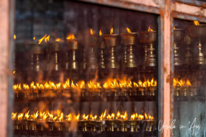 Candles burning in a Shrine, Swayambhunath, Kathmandu Valley Nepal