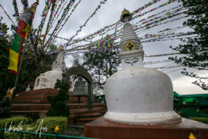 Prayer Flags and a white stupa, Swayambhunath, Kathmandu Valley Nepal