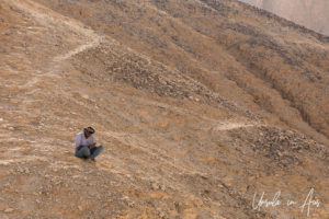 A man with his mobile, Valley of the Kings, Luxor Egypt