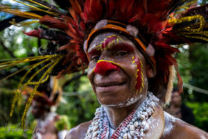 Portrait: Tribal woman from Jiwaka Province in traditional costume, Papua New Guinea