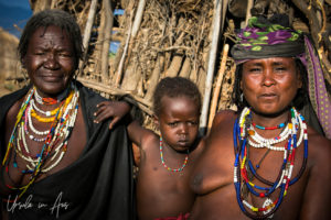 Portrait: Arbore grandmother, mother and toddler, Omo Valley Ethiopia
