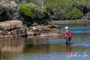 Fisherman standing Back Lake, NSW Australia