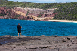 Man rock fishing on Short Point, NSW Australia