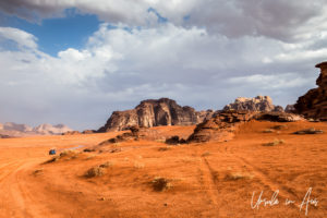 Orange light on the red sands of Wadi Rum, Jordan
