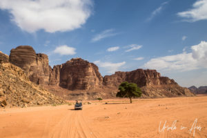 Truckload of tourists in Wadi Rum, Jordan.