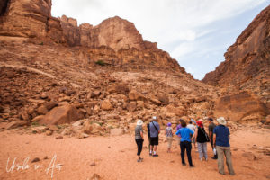 Tourists and red rocks, Wadi Rum Jordan