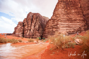 Flowing water in the red rocks, Wadi Rum Jordan