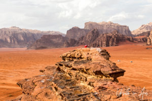 People on the rock formations, Wadi Rum Jordan
