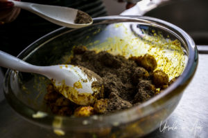 Nepalese potato pickle in glass bowl.